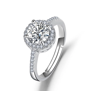 Adjustable silver halo ring with four-prong round cut moissanite and pavé set band