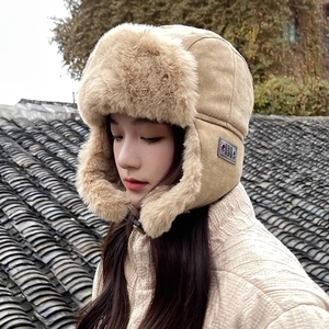 Women's khaki plush trapper hat with ear flaps for winter outdoor windproof protection