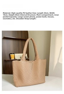 Detailed view of beige woven tote bag dimensions 34x18x30cm with its inner sub-bag