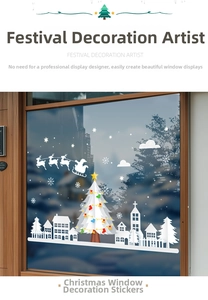 Detail of Christmas window stickers with white tree and reindeer on glass surface