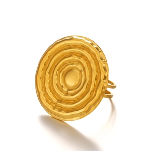 Minimalist matte gold geometric ring with unique concentric circular ripple texture