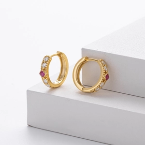 Detail of S925 silver gold earring with red square gemstone and white pavé zircons