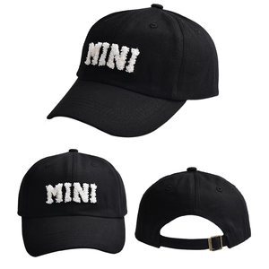 Detailed views of black cotton baseball cap showing MINI embroidery and metal strap buckle