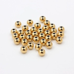 Polished 18K gold-plated stainless steel round beads with center holes for DIY jewelry