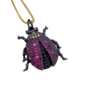 Exquisite gold-plated ladybug pendant necklace encrusted with purple and yellow zircons