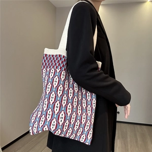 Large knit tote bag with red, white, and blue geometric diamond pattern for women