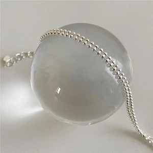 Minimalist S925 sterling silver double-strand bead bracelet with extension chain on glass