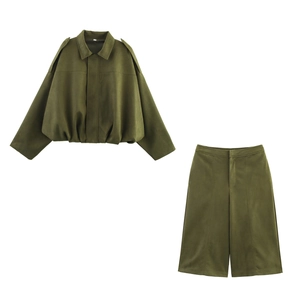 Olive green two-piece set featuring a cropped jacket and matching wide-leg shorts