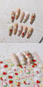 Detail of 3D embossed nail stickers featuring sweet bunnies, strawberries and clouds
