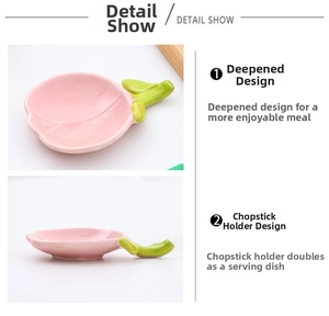 Pink peach ceramic seasoning dish with green leaf detail and integrated chopstick rest