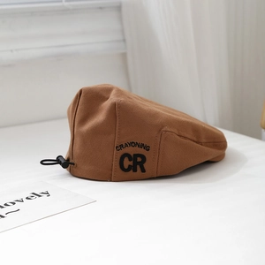 Brown cotton kids beret hat with black CR embroidery and adjustable elastic drawstring