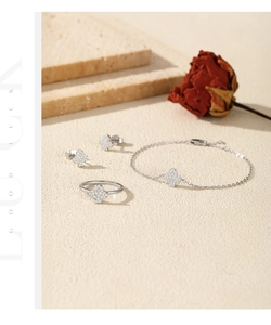 Detailed set of S925 sterling silver clover jewelry with ring, earrings and bracelet