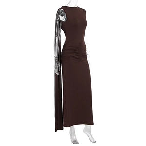 Detail of dark brown ruched waist knit maxi dress featuring a long flowing shoulder streamer