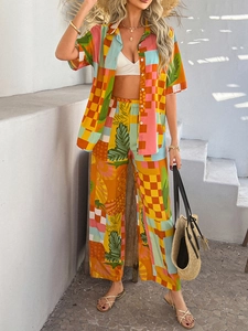 Detail view of Bohemian geometric print set with short-sleeve shirt and wide-leg pants