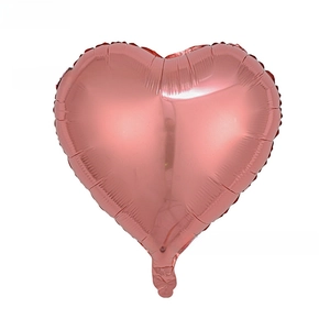 Detailed view of an 18-inch rose gold heart-shaped foil balloon with metallic finish