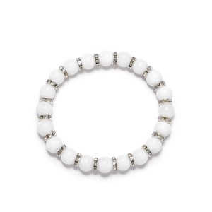 Natural white agate bead bracelet with silver rhinestone rings on white background