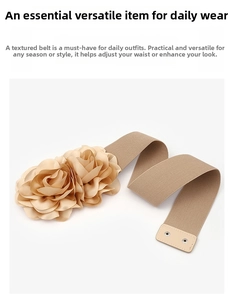 Close-up of khaki elastic belt featuring double satin 3D rose flowers and metal buttons