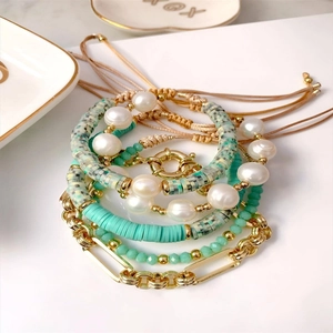 Bohemian multilayer bracelet set with mint clay beads, pearls and gold chain link