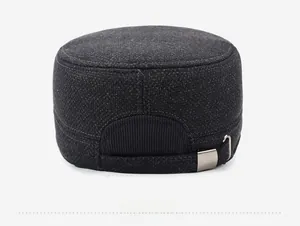 Detail view of the adjustable silver buckle and ribbed strap on the back of the grey military cap