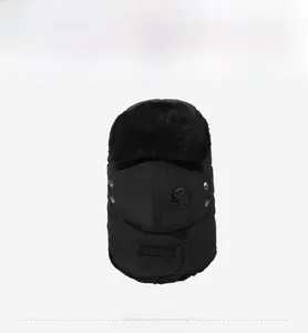 Detail of black winter trapper hat with detachable mask, breathing valve and faux fur lining