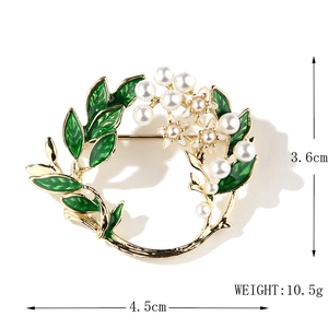 Fashion gardenia flower brooch with white pearls and green enamel in gold finish