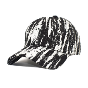 Unisex tie-dye baseball cap featuring black and white tiger patterns on curved brim