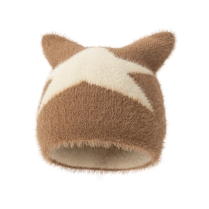 Macro detail of brown star knit cat ear beanie showing fuzzy mohair texture