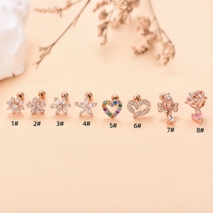 Set of 8 rose gold stud earrings featuring heart, star, and crown designs with zircon stones