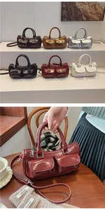 Detailed view of retro leather saddle bag showing multi-pocket design and color options