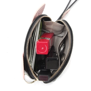 Black leather cartoon pig coin purse with card slots and pink strap for daily essentials