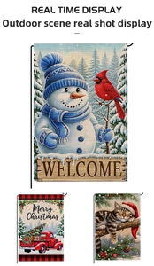 Close-up of linen garden flags featuring snowmen and red truck Christmas prints
