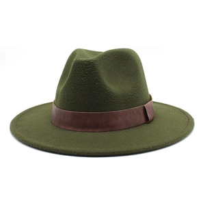 Detail of dark green wool fedora hat featuring a brown leather decorative strap band