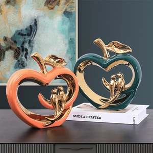 Modern ceramic apple sculptures with gold bird figurines for living room shelf decor