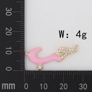 Detailed macro view showing a pink enamel pendant with gold plating and white zircon inlay
