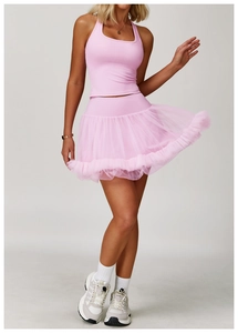 Pink high-waist yoga set featuring a halter tank top and a layered tulle active skirt