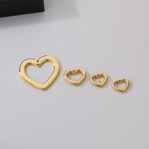 Golden heart-shaped hollow stainless steel pendants in various sizes and styles