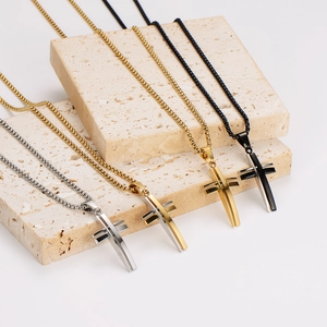 Minimalist hollow stainless steel cross pendants in silver, gold, and black finishes