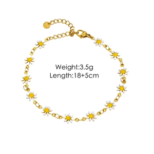Detail of gold daisy chain bracelet with white enamel flowers and lobster clasp closure