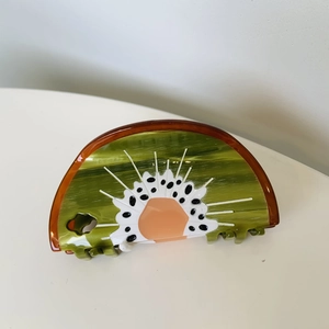 Creative kiwi fruit sliced pattern hair claw clip made of acetate material on white background