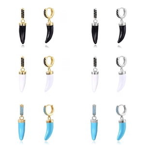 Elegant gold and silver horn earrings with colorful stones and pavé diamonds set