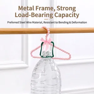 Pink pearl pet hanger with strong metal core and decorative ribbon for small clothes