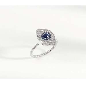 Detailed close-up of S925 sterling silver evil eye spinning ring with blue zircons