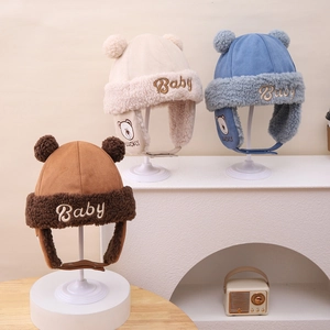 Winter baby aviator hat with bear ears in brown, beige, and blue fleece-lined fabric