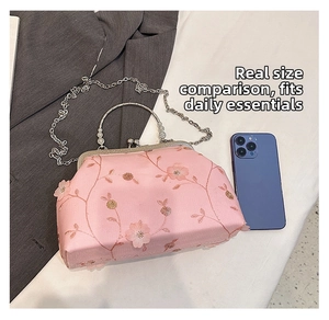 Detailed size comparison of pink floral embroidered handbag with chain strap and phone