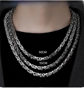 Length comparison of silver Byzantine chain necklaces on model neck at 50, 55, and 60 cm