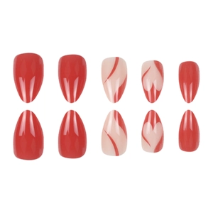 Red hollow heart almond press-on nails set with festive pattern on white background