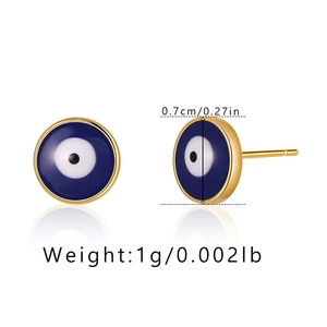 Detail view of 0.7cm evil eye stud earrings with blue enamel and gold finish