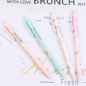 Detailed view of 0.7mm mechanical pencils with cute bear and strawberry patterns