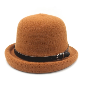 Caramel knitted bowler hat with black leather strap and brim for middle-aged women
