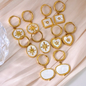 French vintage 14K gold earrings with white shell pendants in star and heart shapes